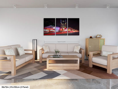 a living room filled with furniture and a painting on the wall