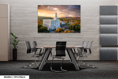 a dining room table with chairs and a painting of a church