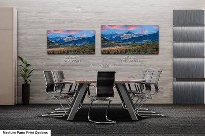 a dining room with a table and chairs