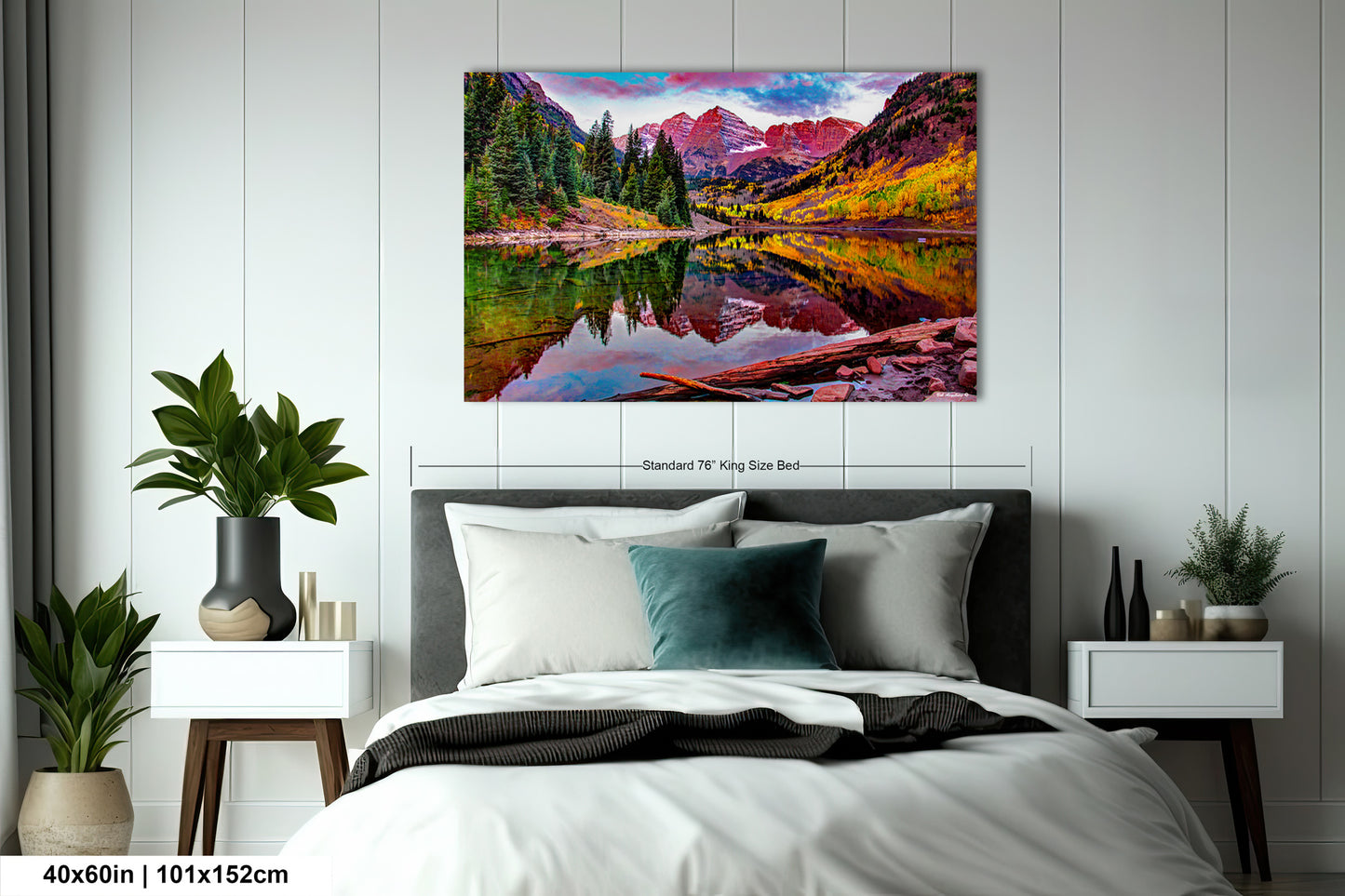 a bedroom with a bed and a painting on the wall