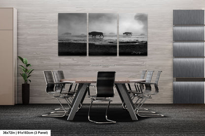 a black and white photo of a table and chairs