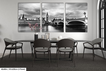 a black and white photo of a dining room table