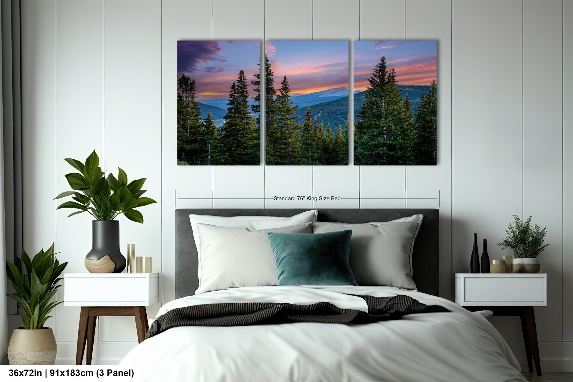 A bedroom with a large bed, nightstands, and a large wall art depicting a scenic mountain landscape with pine trees and a colorful sunset.