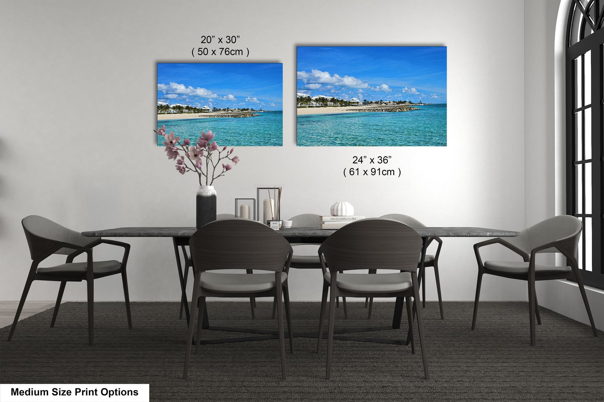 a dining room table with chairs and a vase of flowers