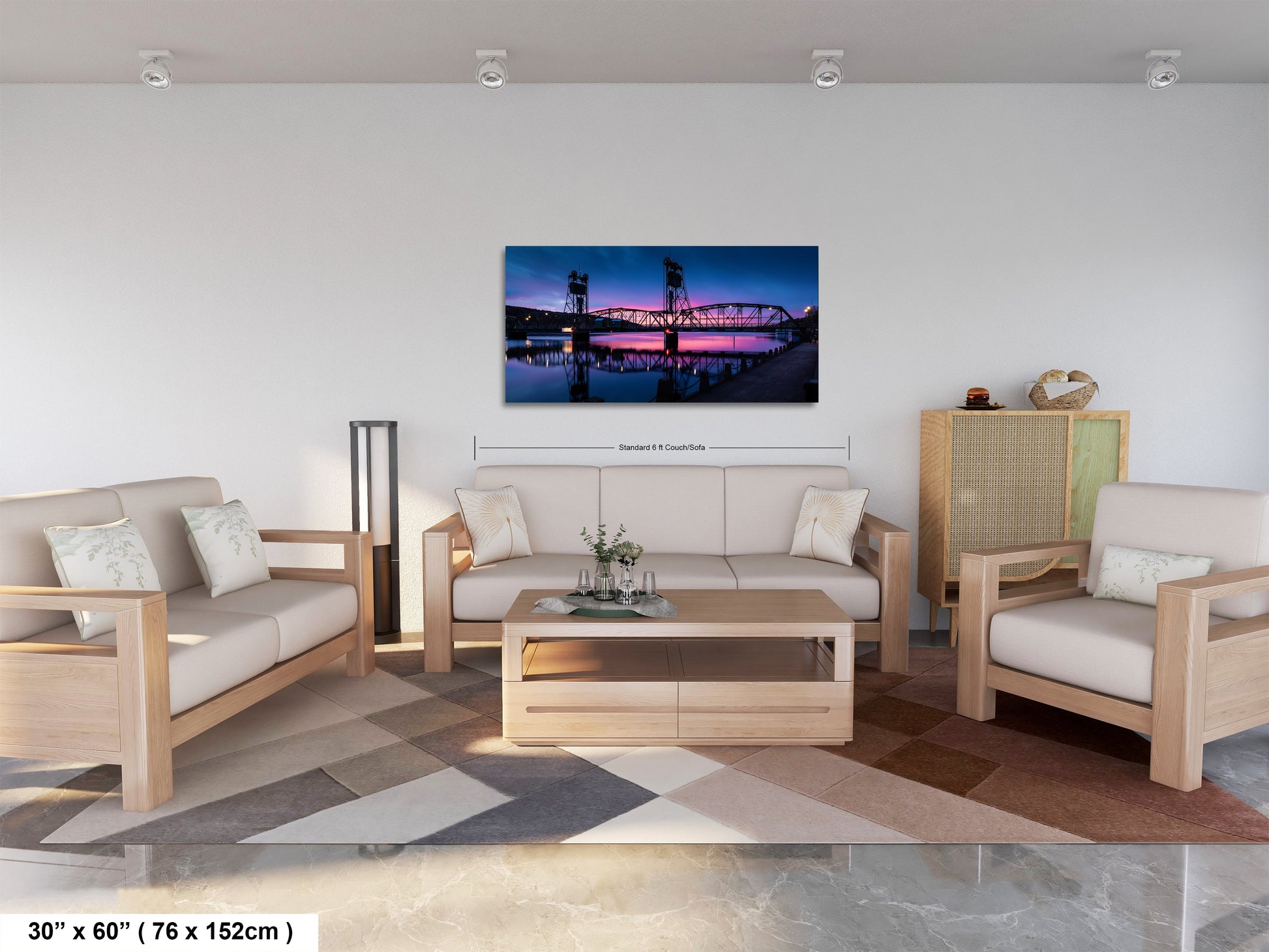 a living room filled with furniture and a painting on the wall