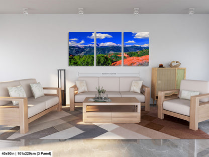 a living room filled with furniture and a painting on the wall