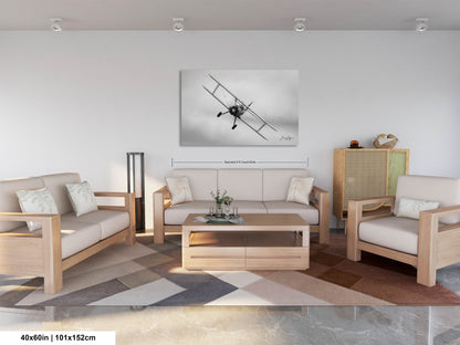 a living room filled with furniture and a painting on the wall