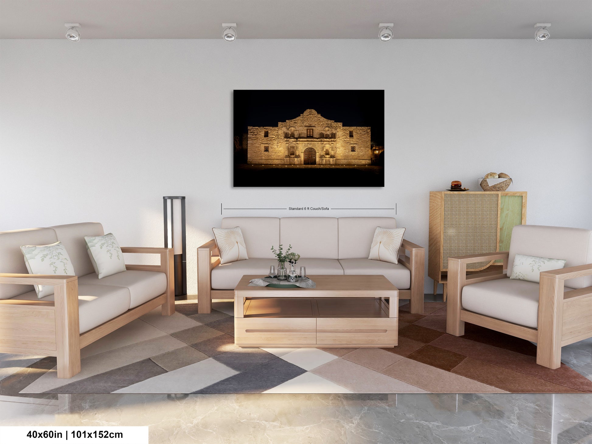 a modern living room with a large framed photograph of the Alamo in the background.