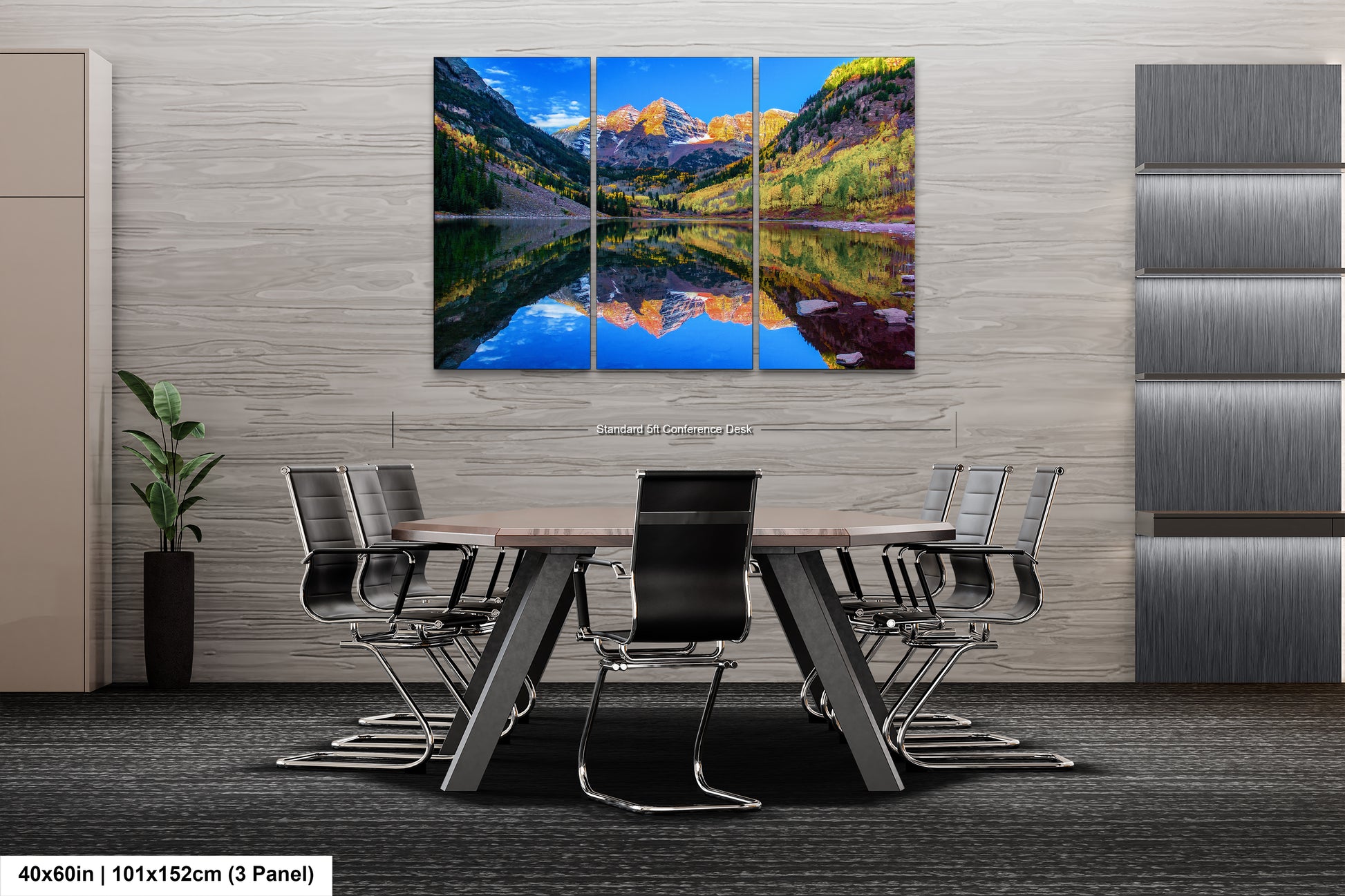 a dining room table with chairs and a painting on the wall