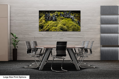a dining room table with chairs and a painting on the wall
