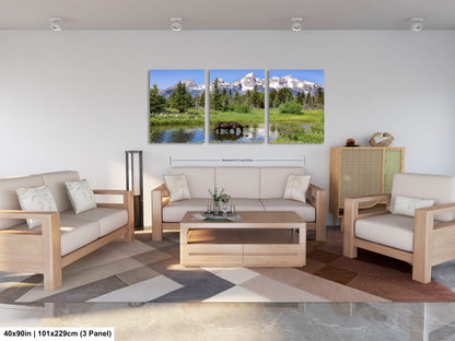 a living room filled with furniture and a painting on the wall