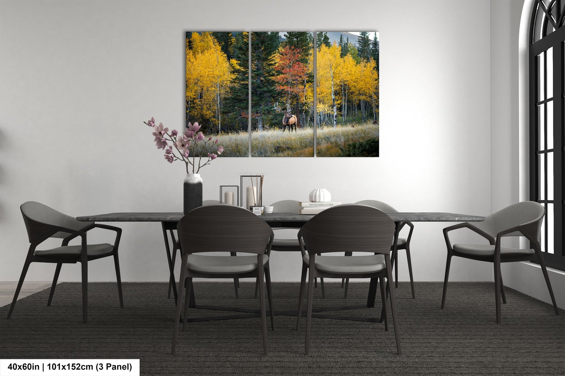 a dining room with a table and chairs