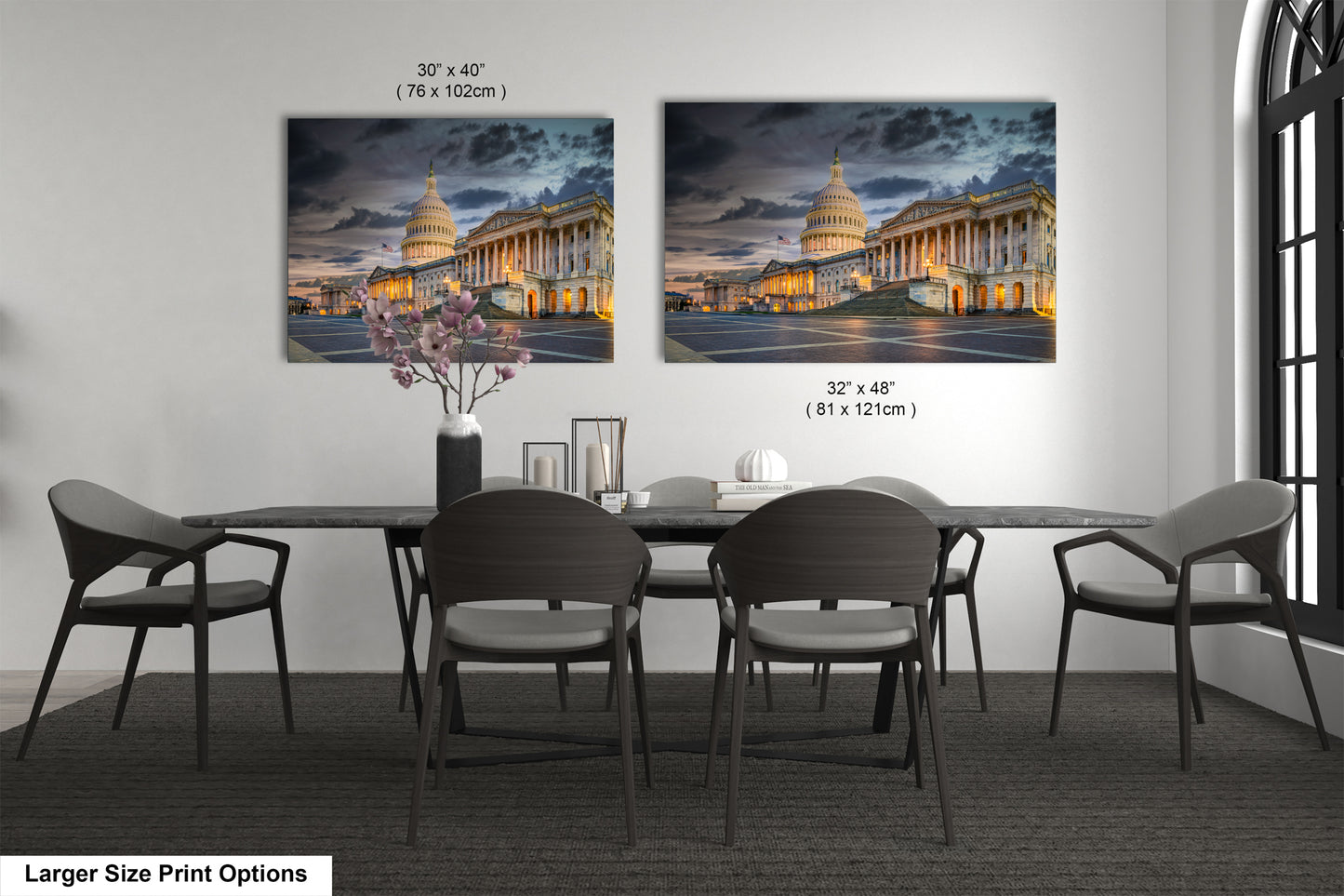 a dining room table with chairs and a vase of flowers