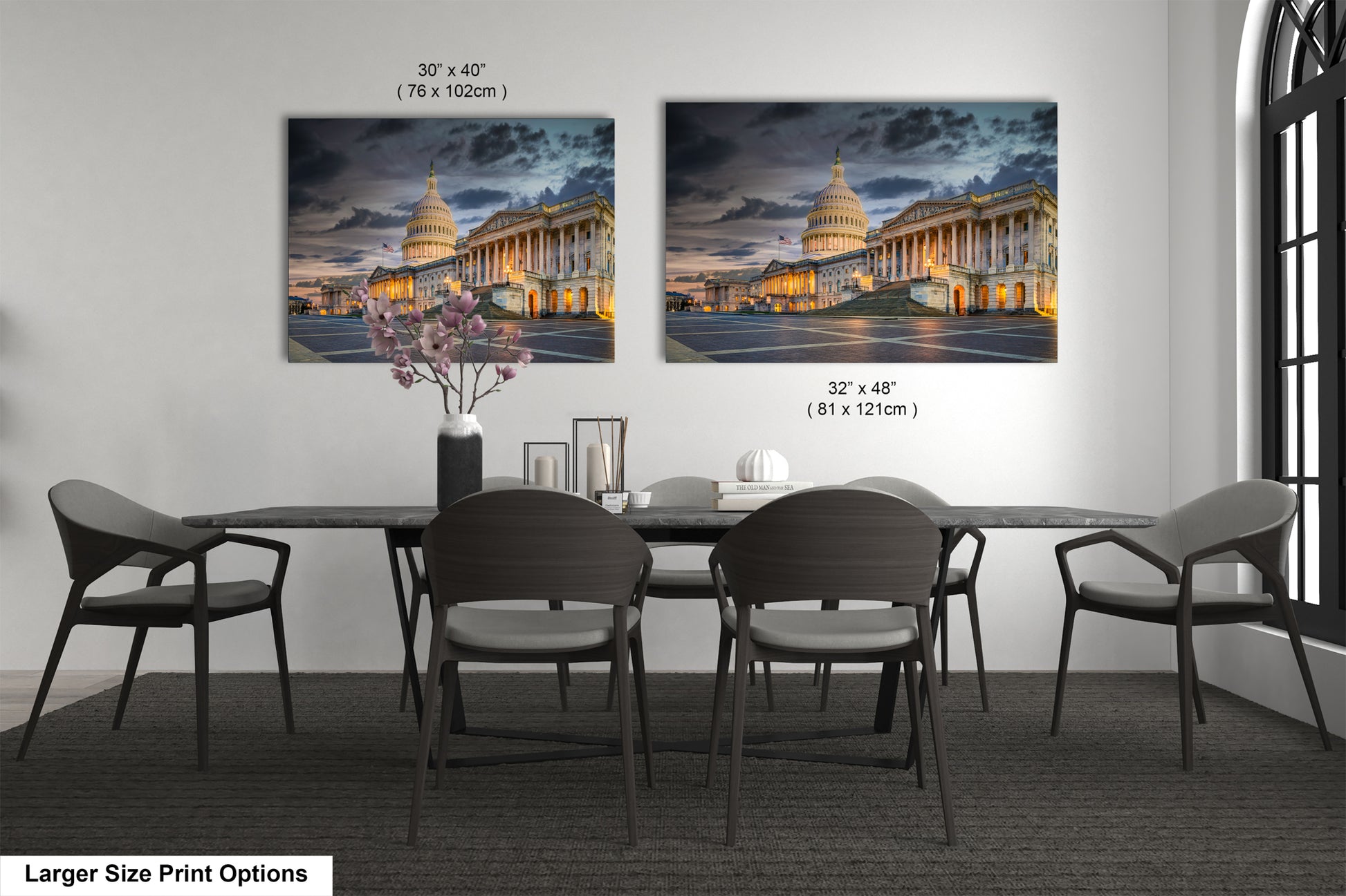 a dining room table with chairs and a vase of flowers