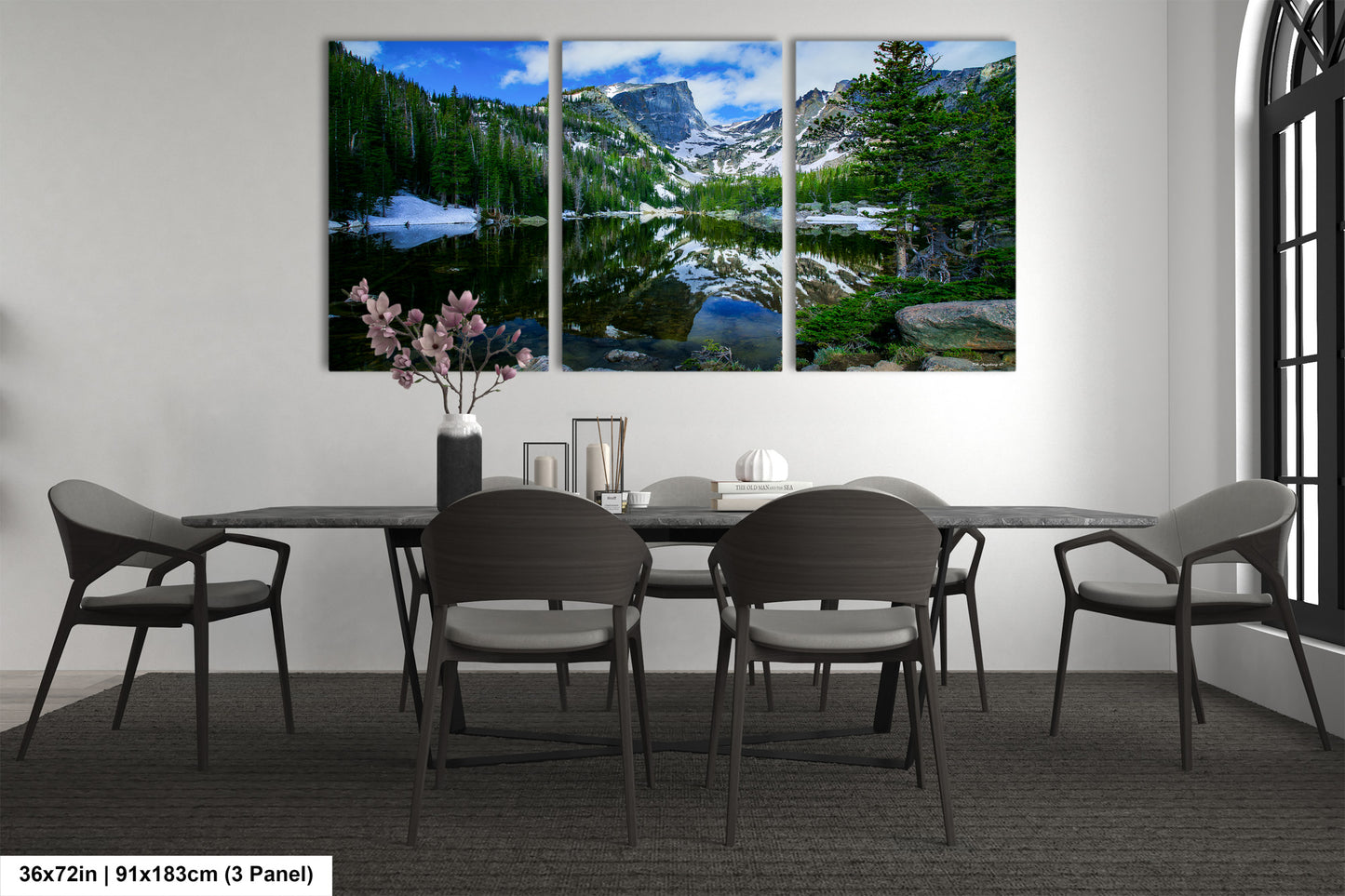 a dining room with a table and chairs