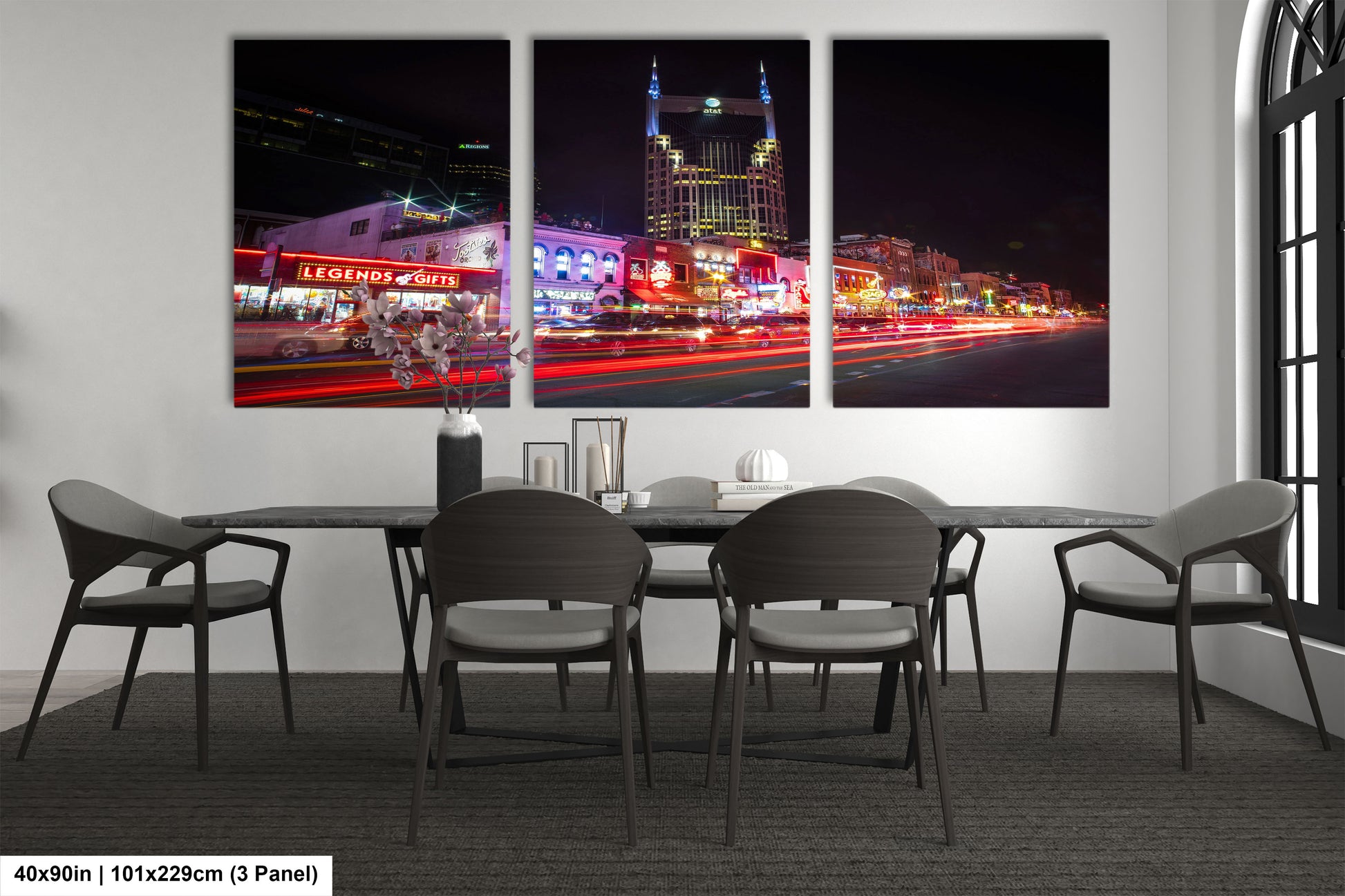 a dining room with a table and four chairs
