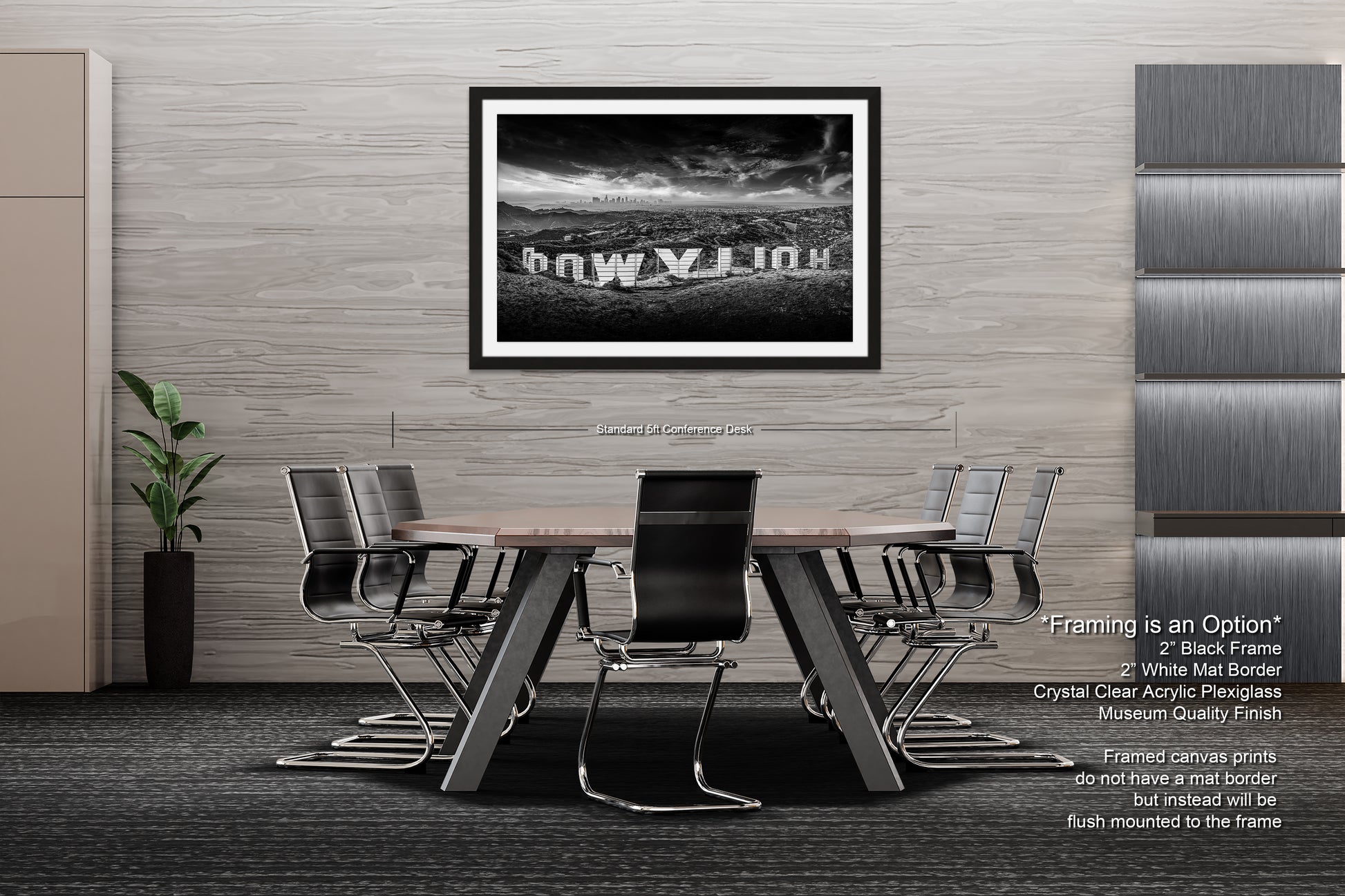 a black and white photo of a table and chairs