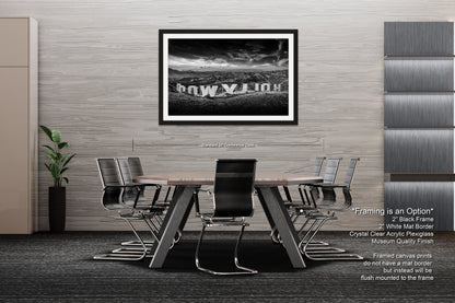 a black and white photo of a table and chairs