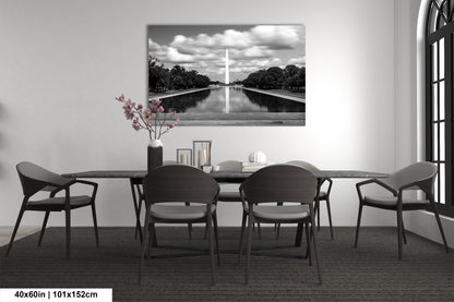 a black and white photo of a table and chairs
