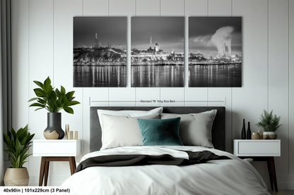 a black and white photo of a bedroom