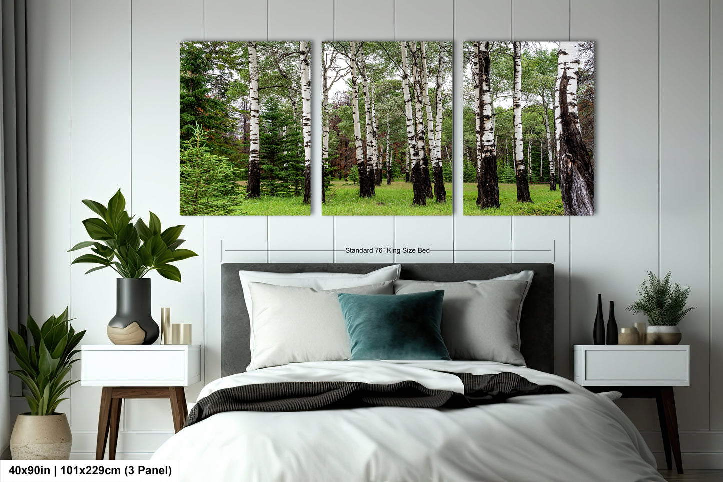 a bed room with a neatly made bed and two pictures on the wall