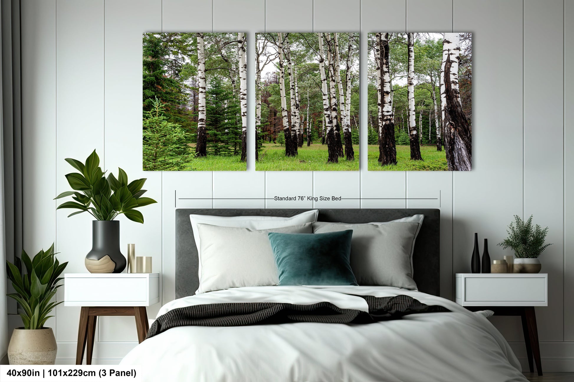 a bed room with a neatly made bed and two pictures on the wall