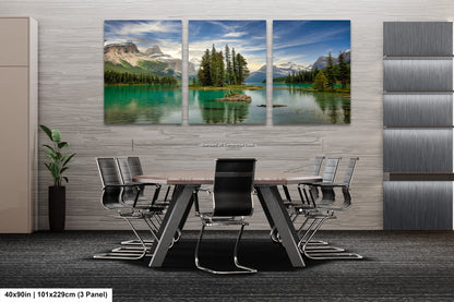 a dining room table with chairs and a painting on the wall