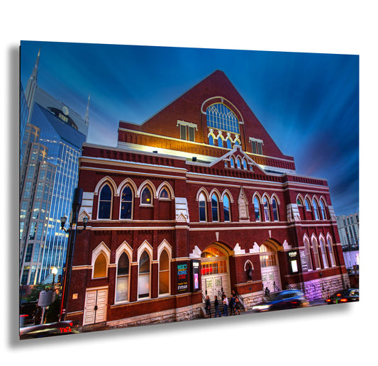 a large red brick building with a clock tower