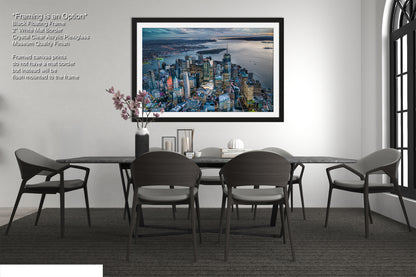 a dining room table with chairs and a picture hanging on the wall