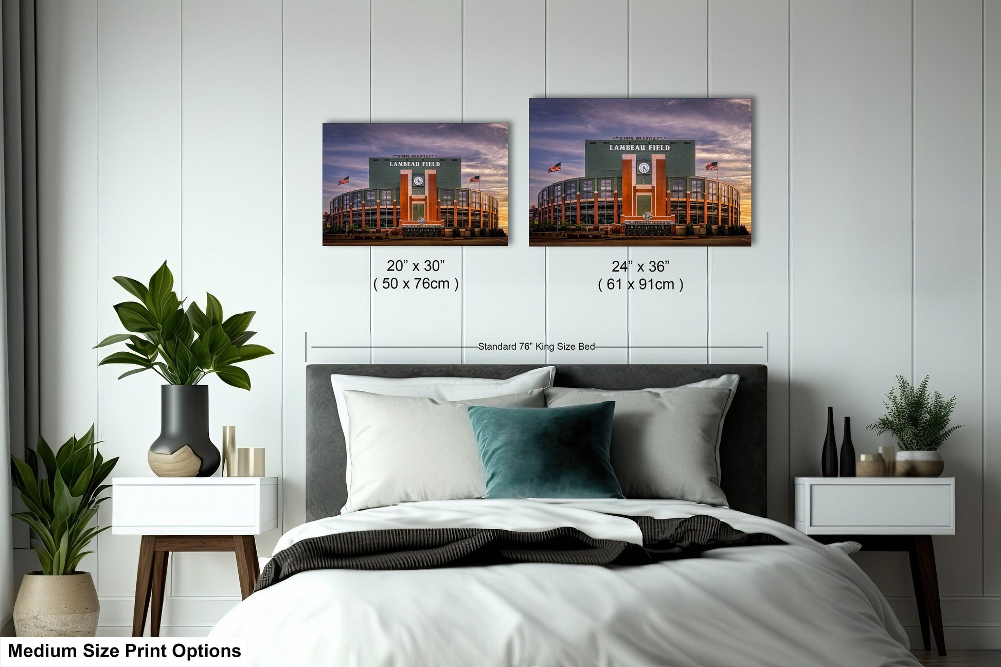 a bedroom with a bed and two pictures on the wall