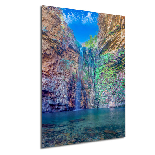 a picture of a waterfall in a canyon