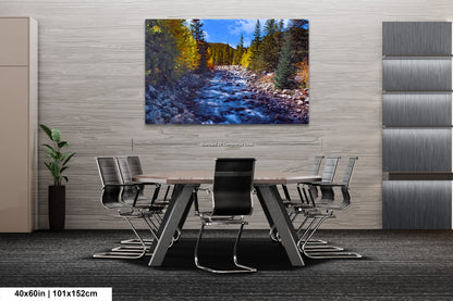 a painting of a river running through a forest