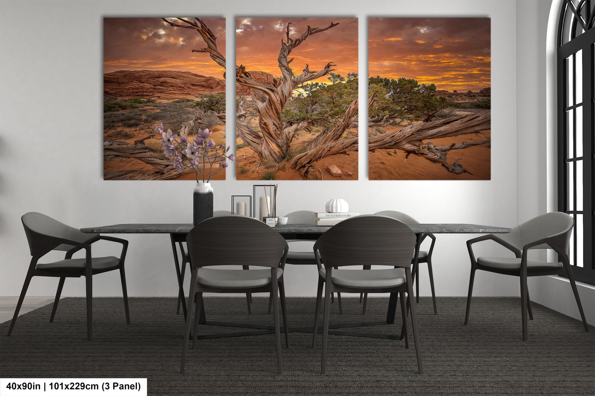 a dining room with a table and four chairs