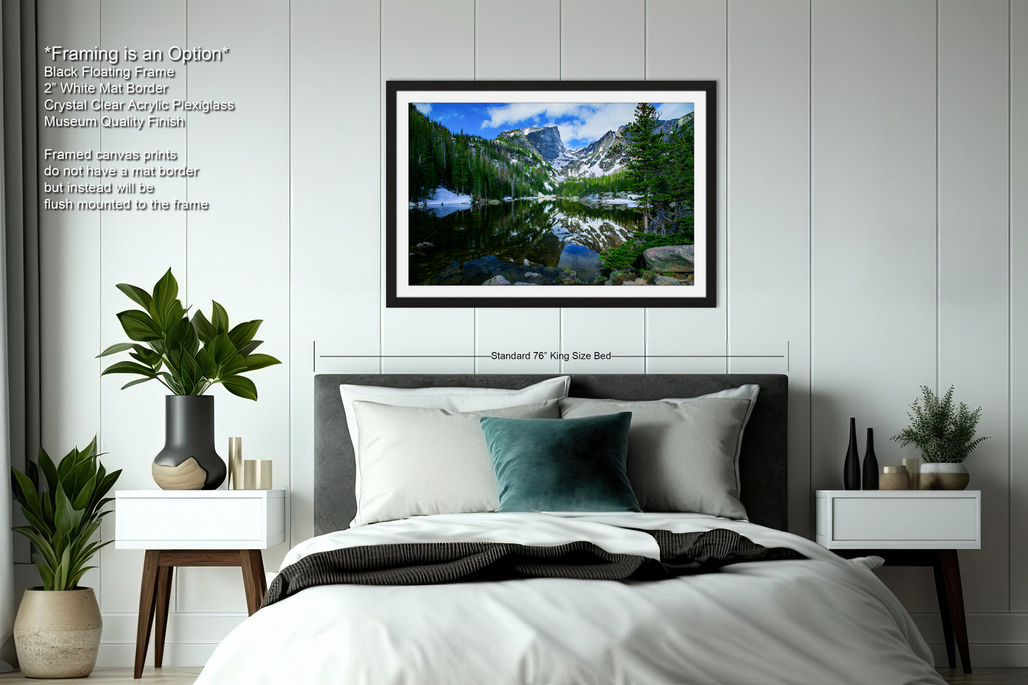 a bedroom with a bed and a picture hanging on the wall