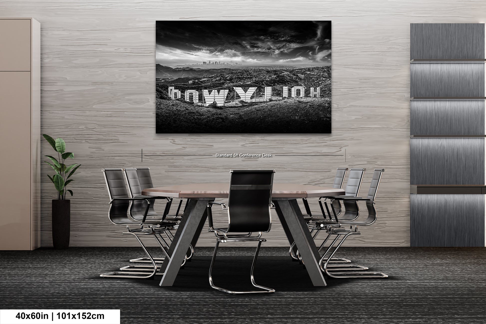 a black and white photo of a table and chairs