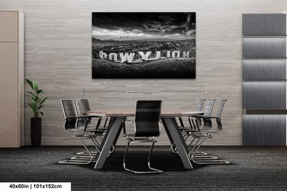 a black and white photo of a table and chairs