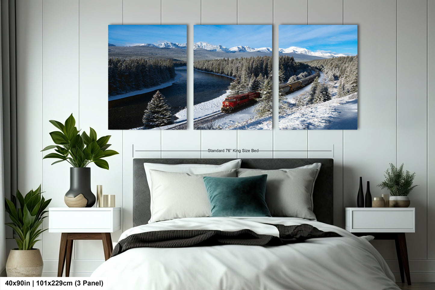 The image is a large, three-panel print depicting a snowy mountain landscape with a train traveling through it.