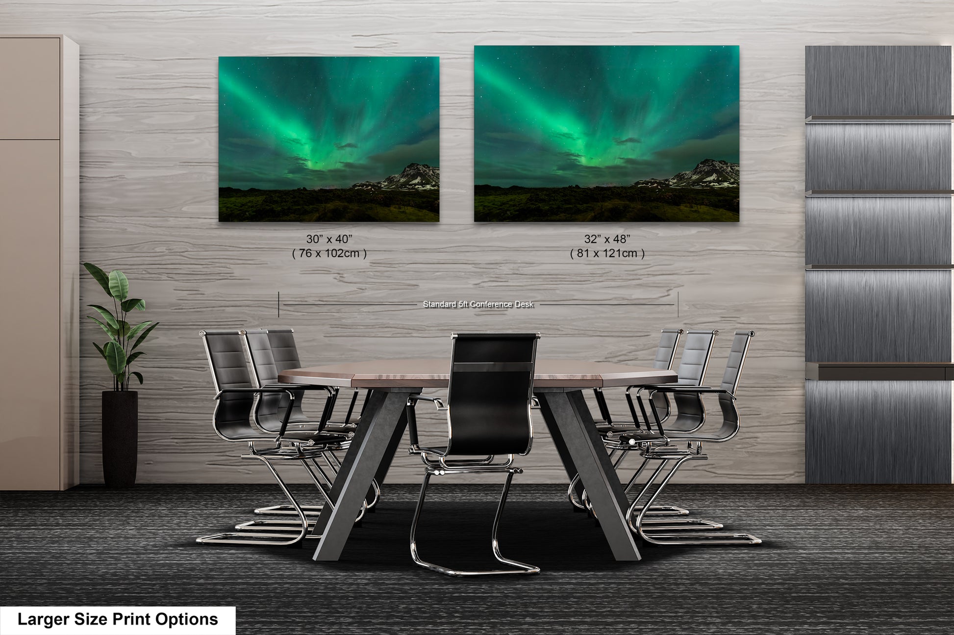 a dining room table with chairs and two pictures of the northern lights