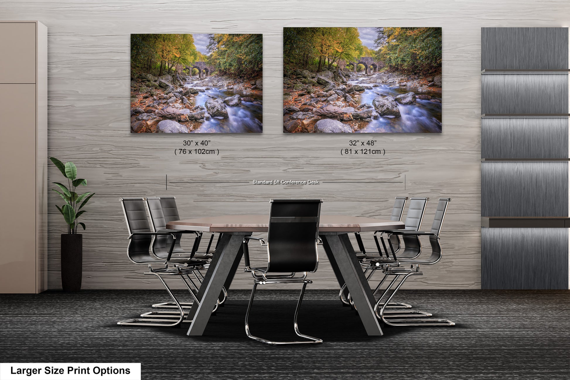 a dining room table with chairs and two pictures on the wall