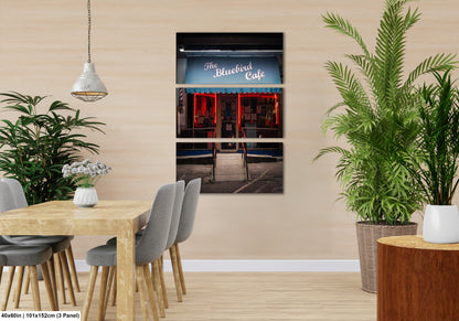 a dining room with a table and chairs
