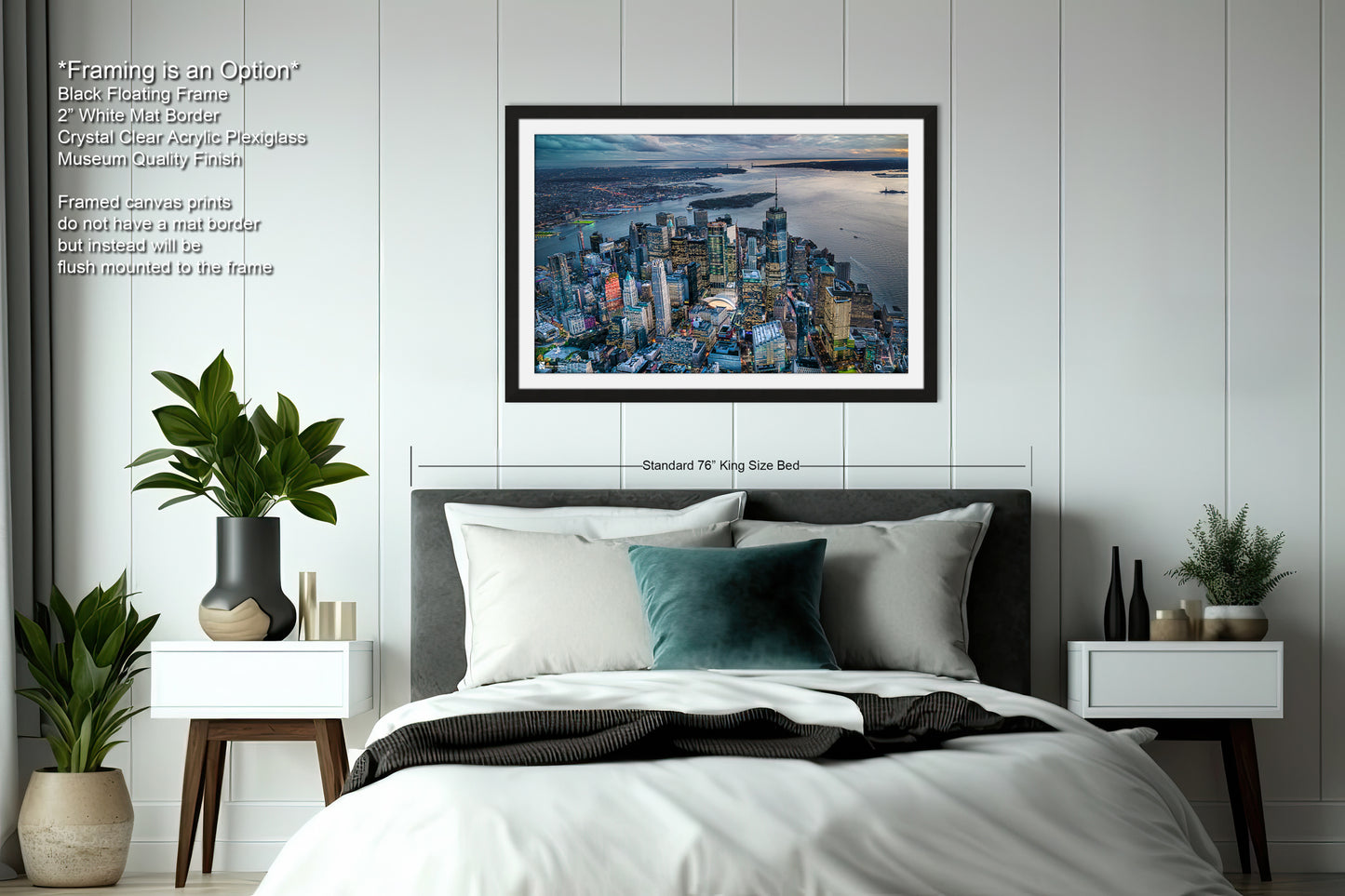 a bedroom with a picture of a city on the wall