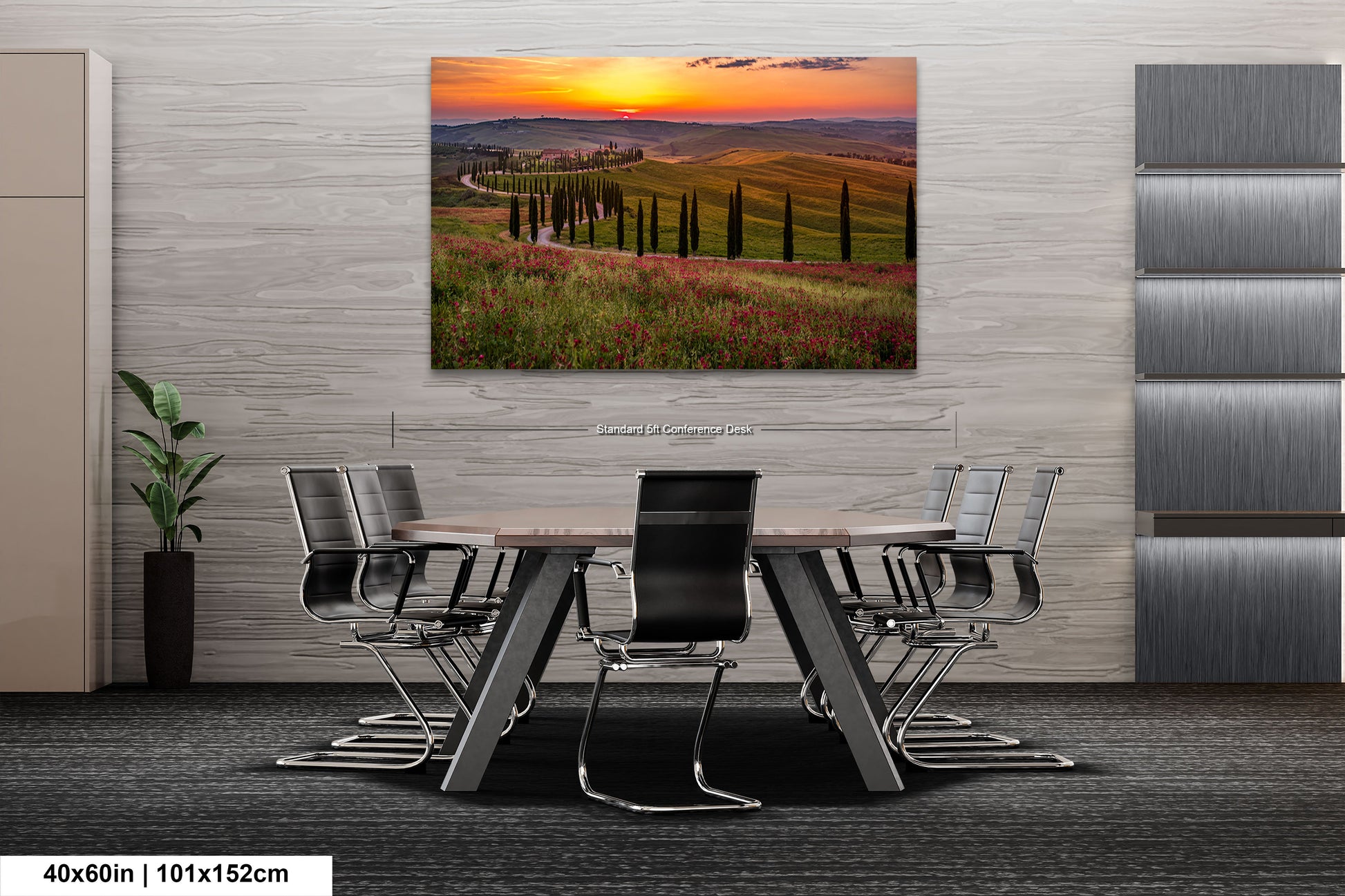 a dining room table with chairs and a painting on the wall