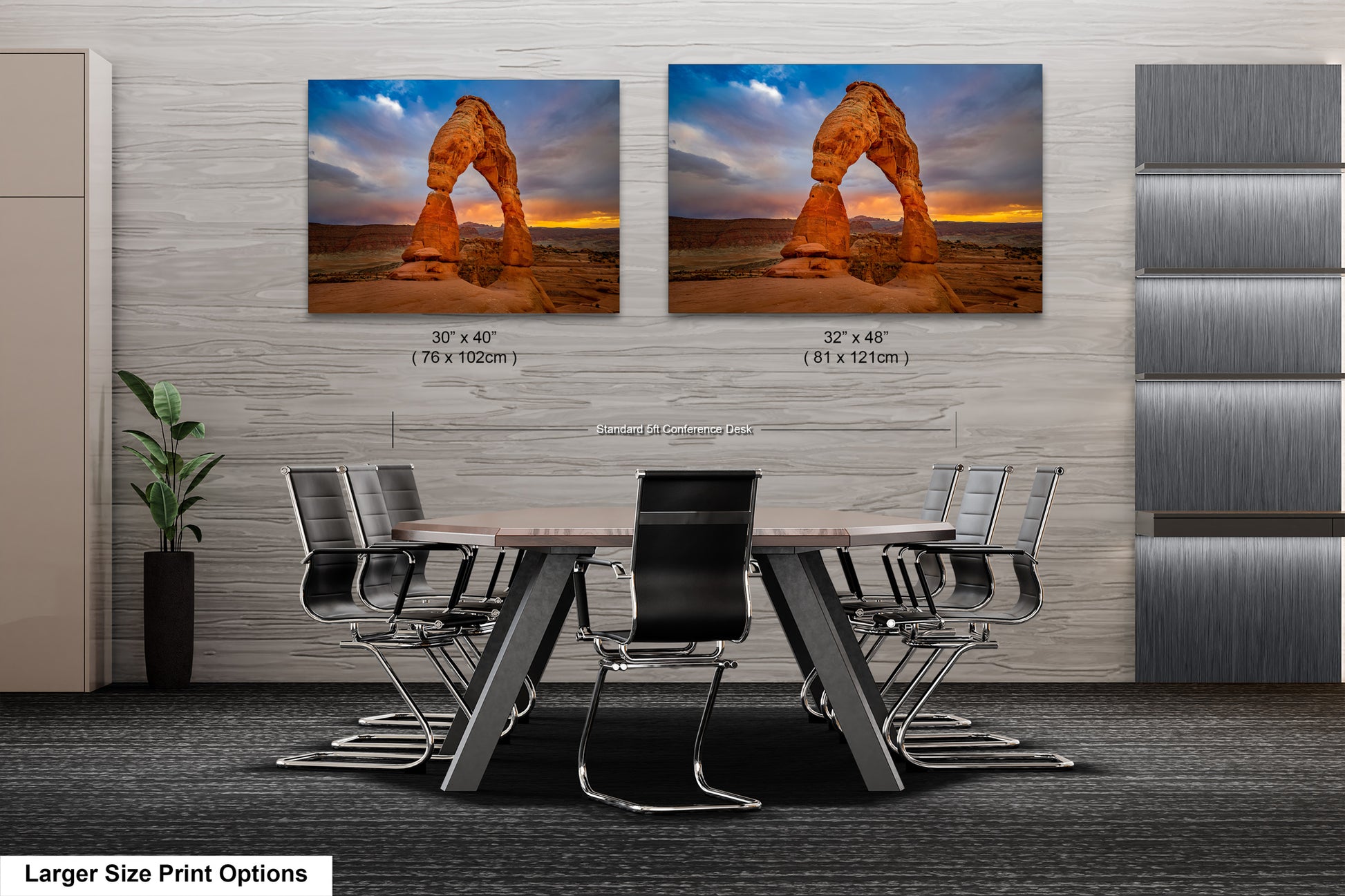 a dining room table with chairs and two pictures of a rock formation