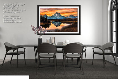 a dining room with a table and chairs