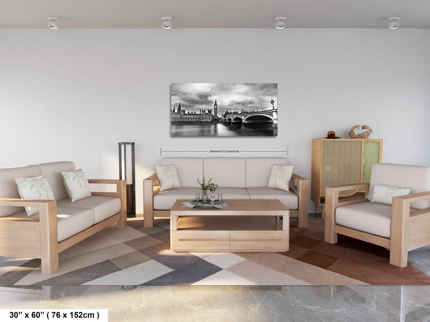 a living room filled with furniture and a painting on the wall