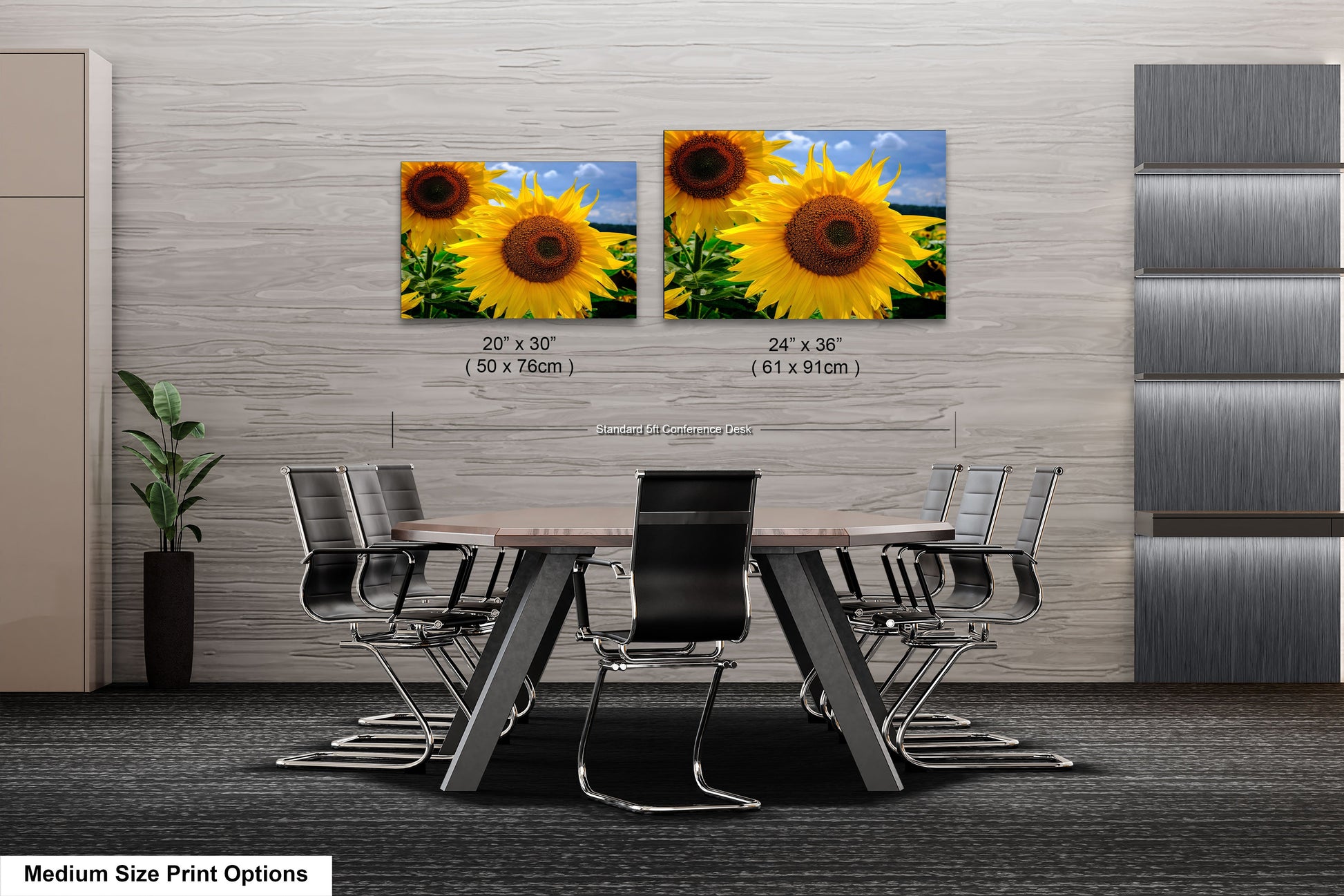 a dining room table with chairs and two pictures of sunflowers on the wall