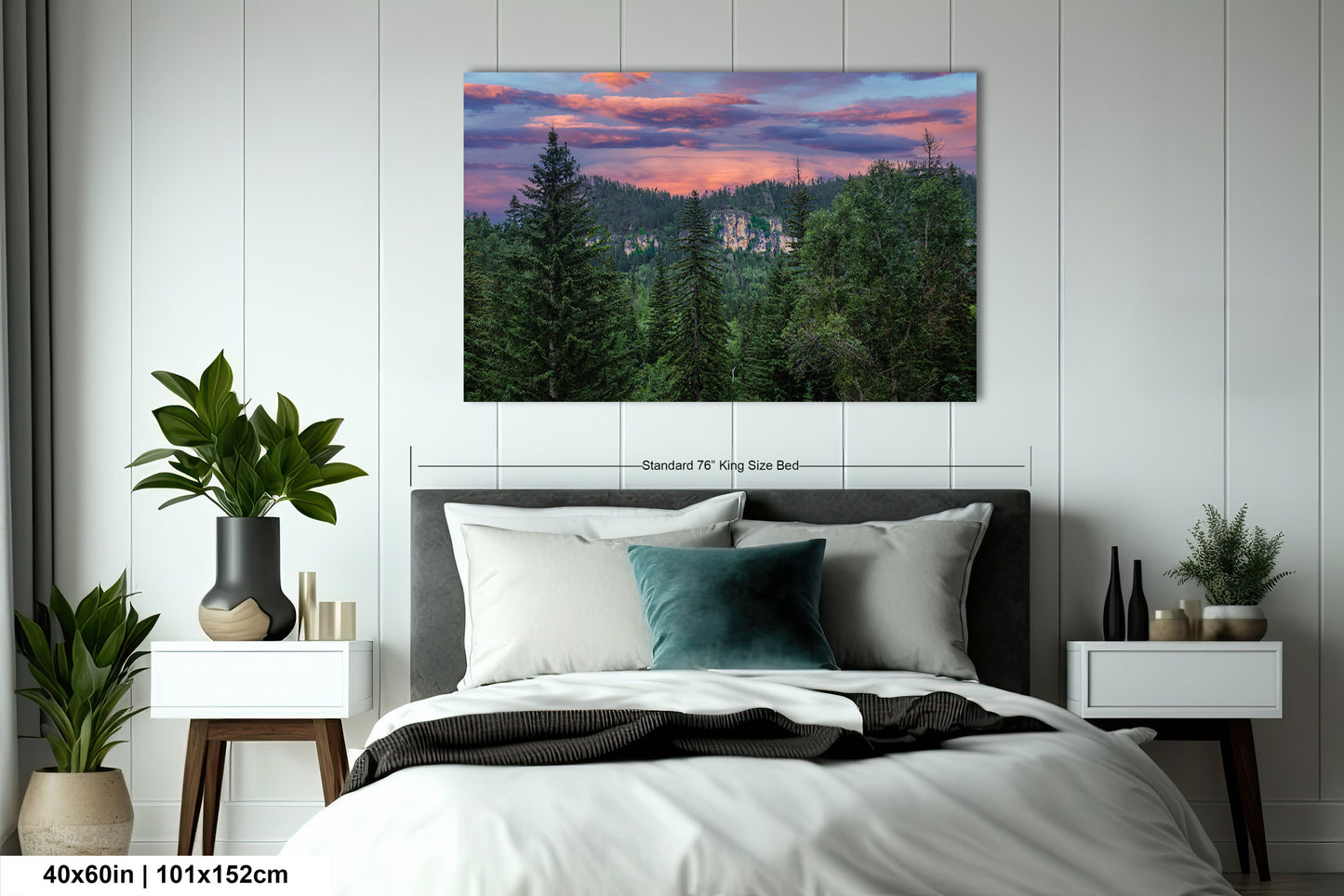 a bedroom with a bed and a painting on the wall