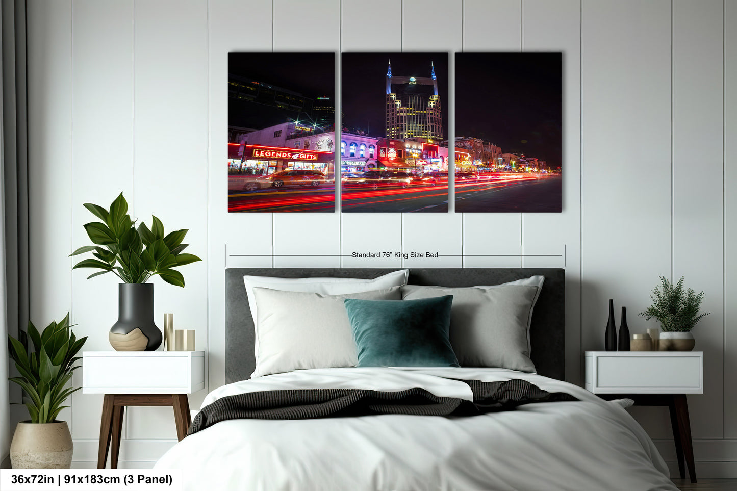 a bedroom with a bed and a night scene
