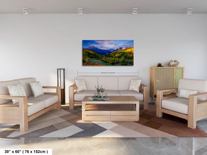 a living room filled with furniture and a painting on the wall