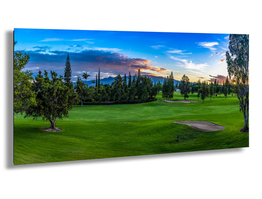 a painting of a golf course at sunset